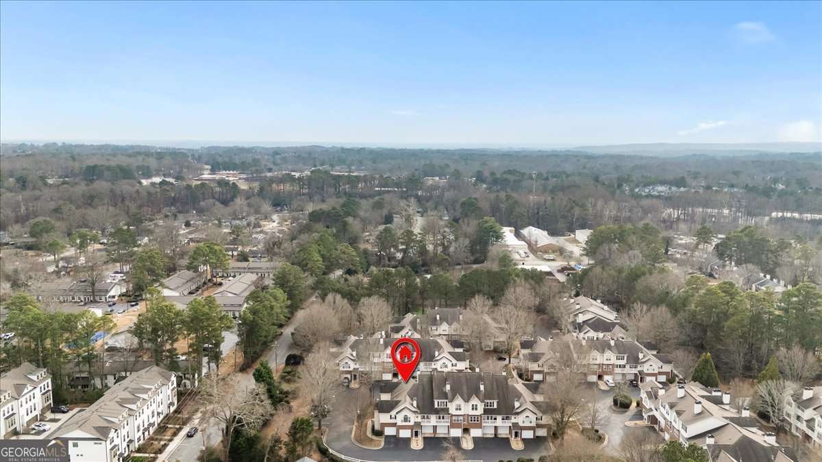 803 Spring Heights Lane, Unit 8 Smyrna, GA 30080 - Photo 41 of 46 an aerial view of house with yard and mountain view in back