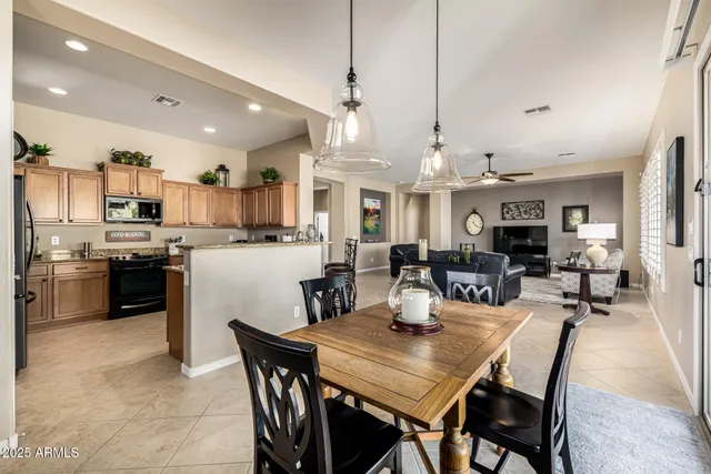 a kitchen with granite countertop a sink and cabinets