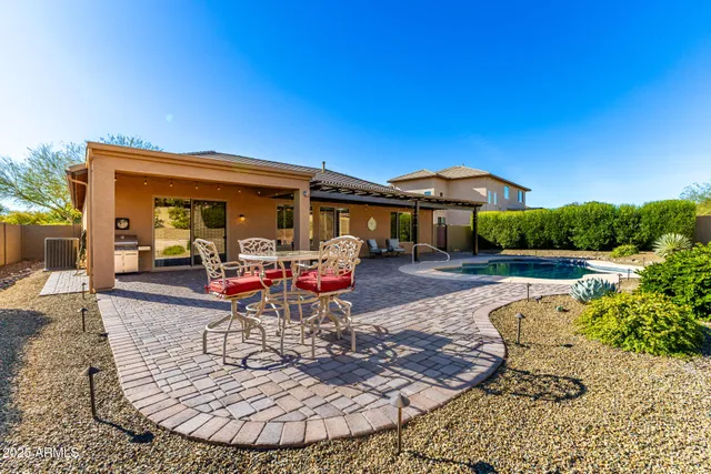 a view of a house with swimming pool