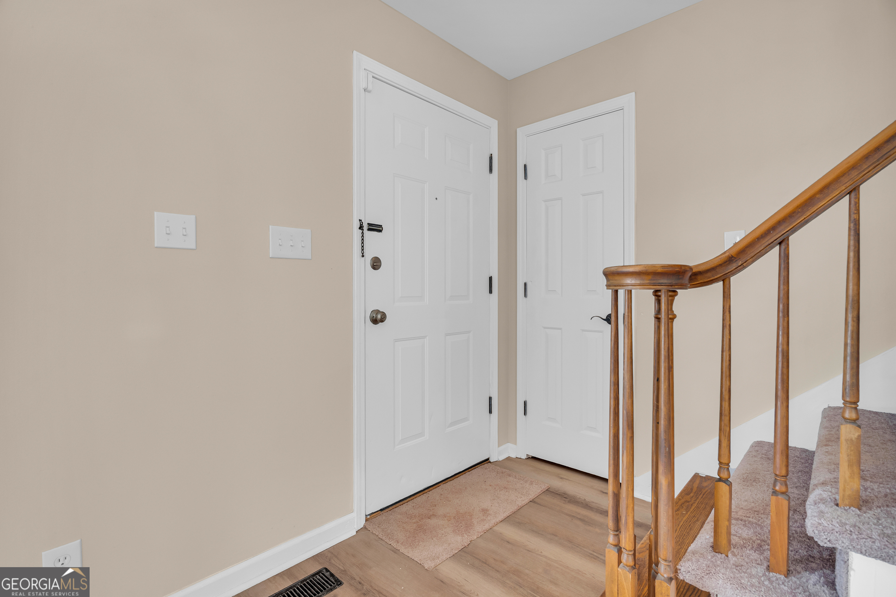 694 Lovers Lane Toccoa, GA 30577 - Photo 20 of 50 a view of a room with wooden floor and windows
