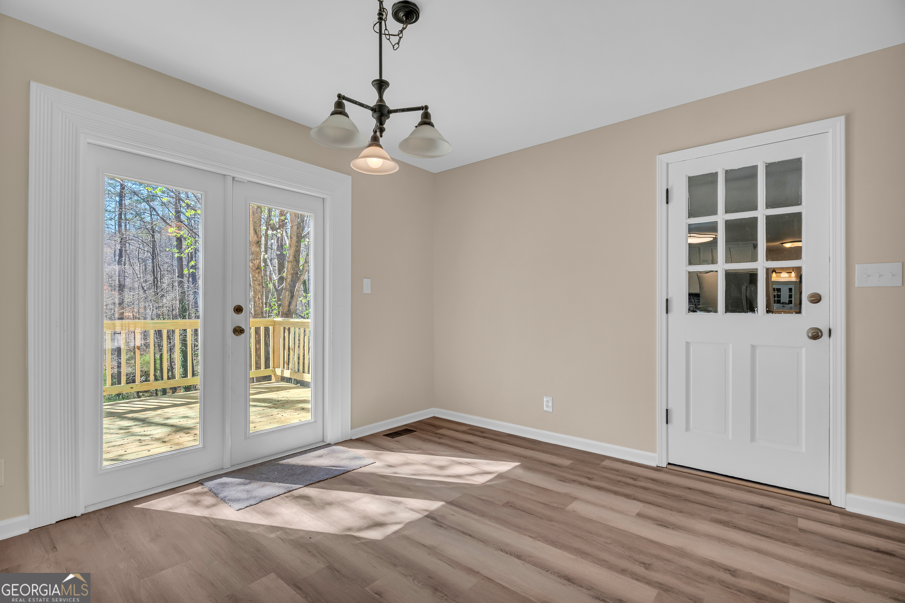 694 Lovers Lane Toccoa, GA 30577 - Photo 24 of 50 a view of an empty room with a window
