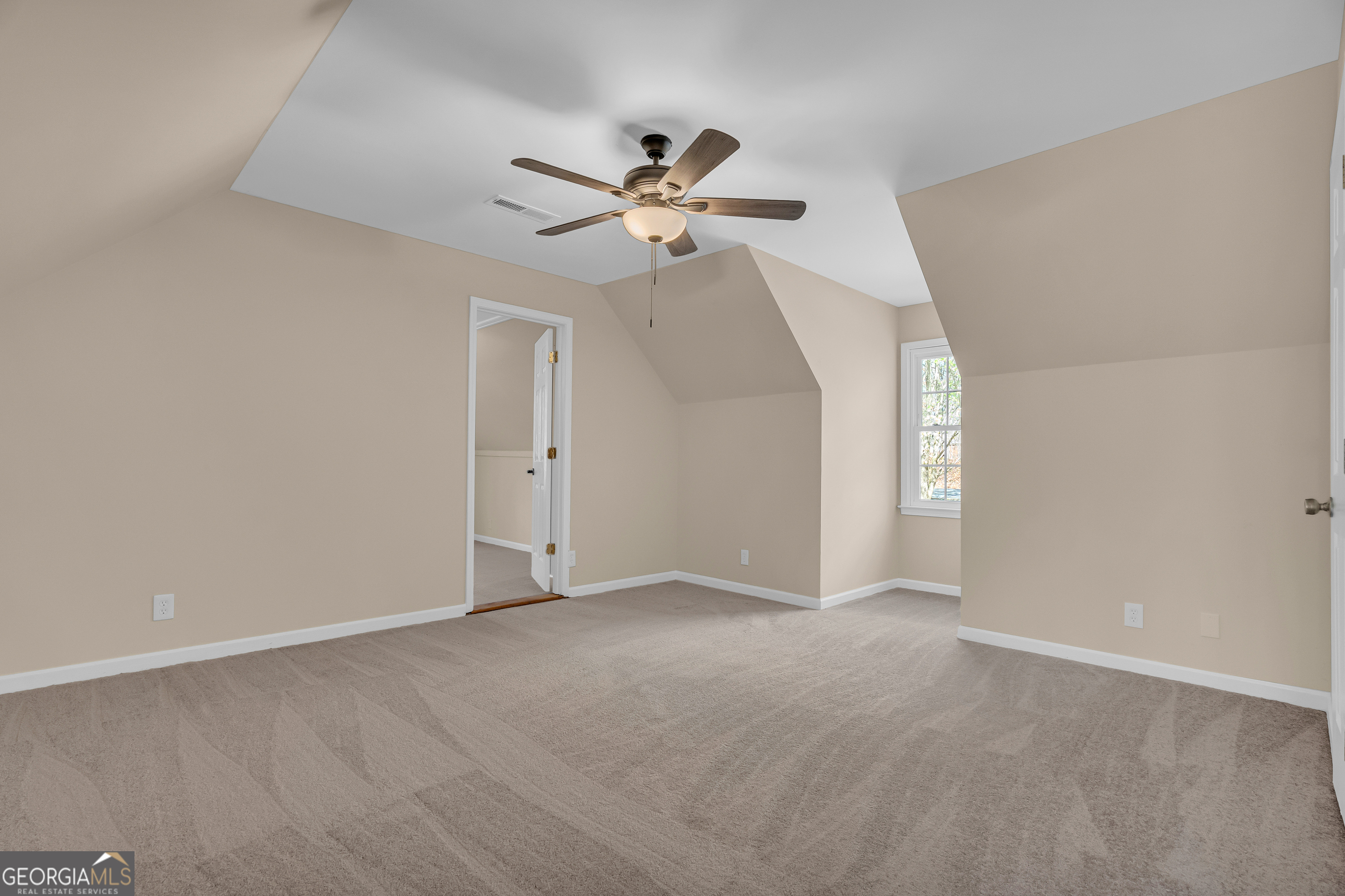 694 Lovers Lane Toccoa, GA 30577 - Photo 38 of 50 a view of an empty room with a window