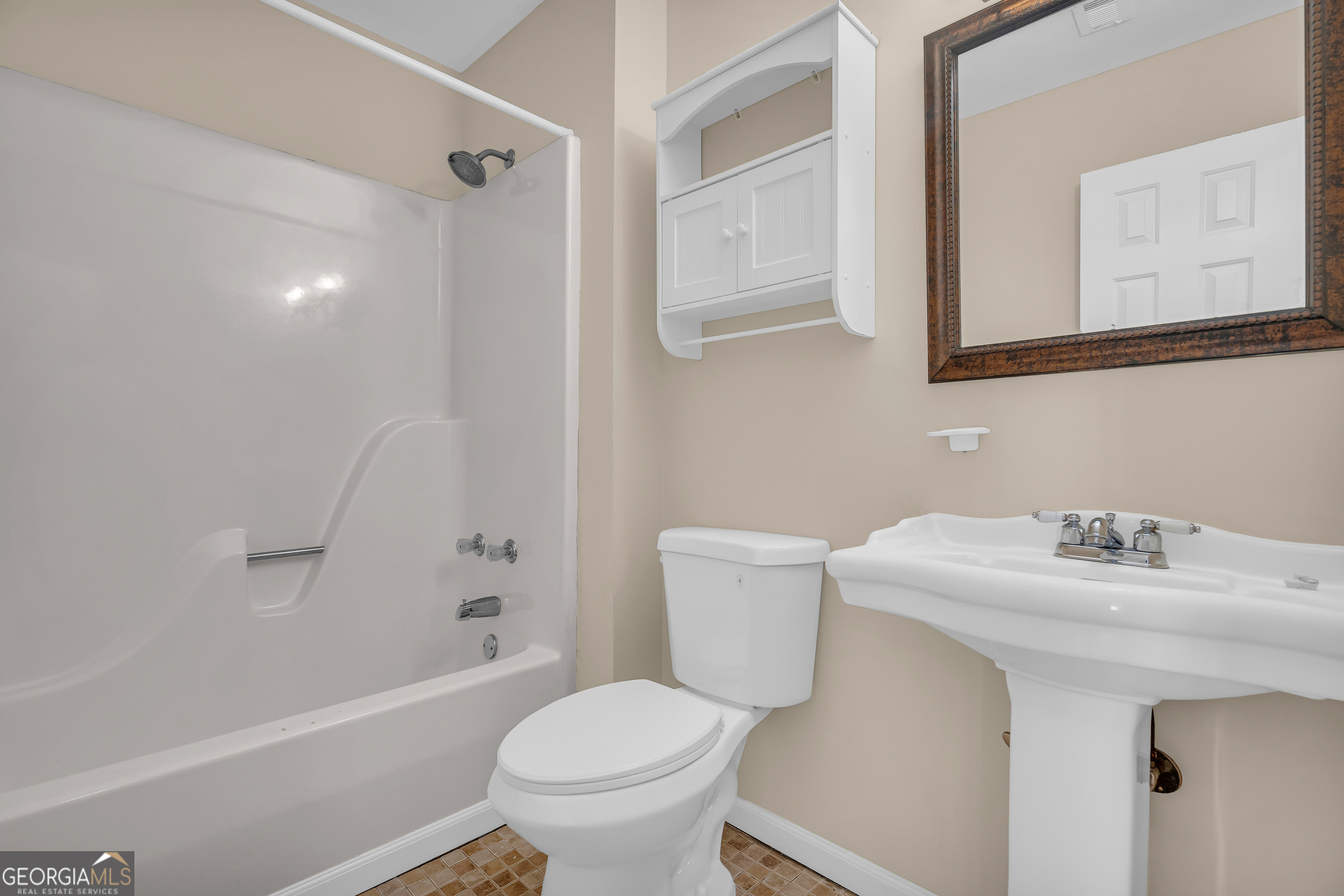 694 Lovers Lane Toccoa, GA 30577 - Photo 42 of 50 a bathroom with a sink toilet and shower