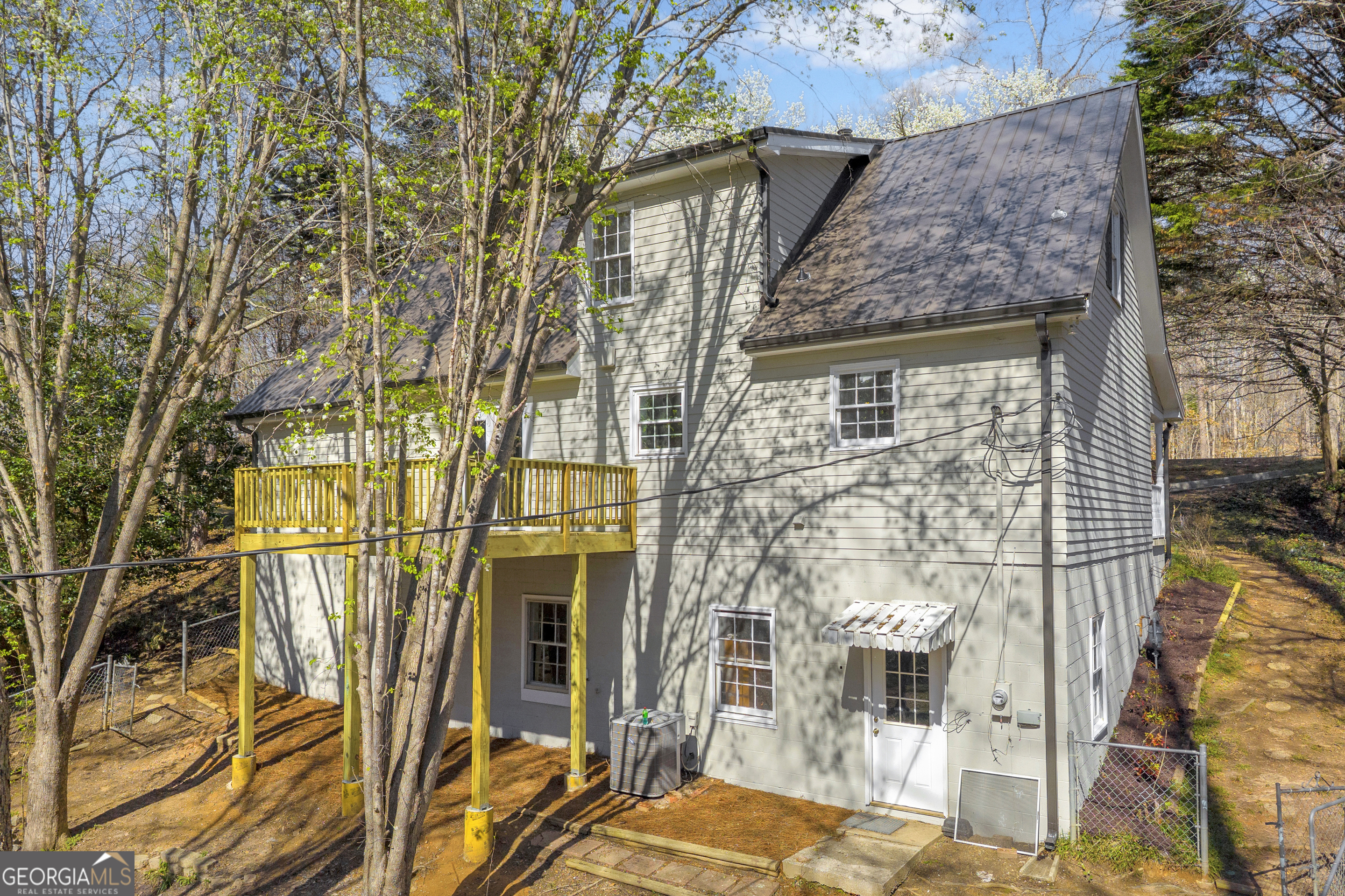 694 Lovers Lane Toccoa, GA 30577 - Photo 5 of 50 front view of a brick house with a large tree