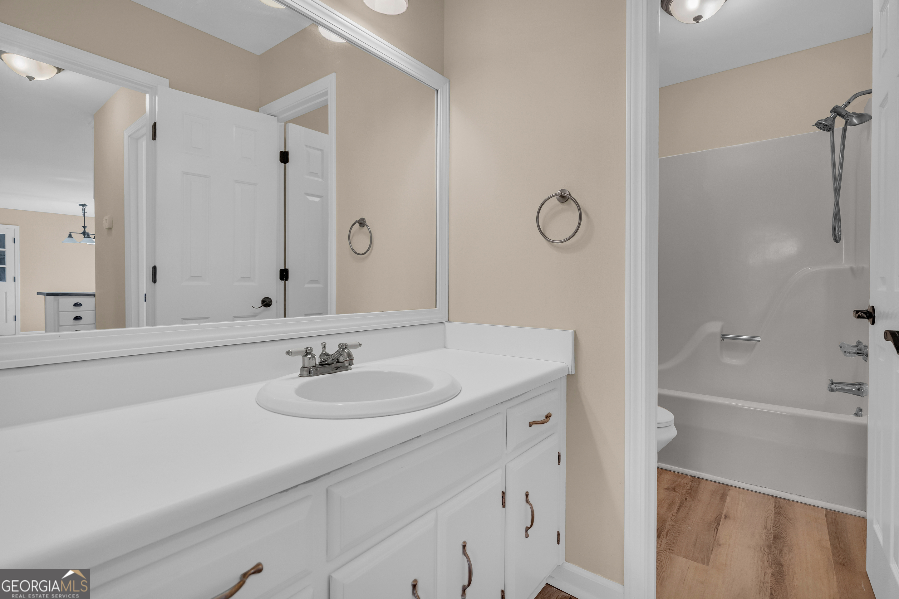 694 Lovers Lane Toccoa, GA 30577 - Photo 9 of 50 a bathroom with a sink and a mirror