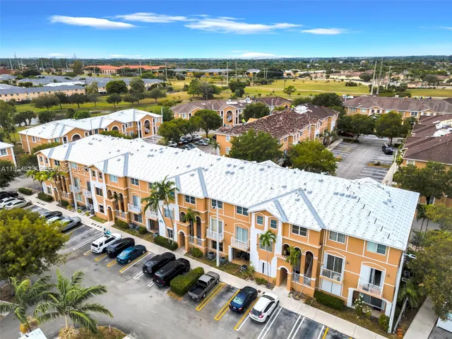 a view of a city with an ocean view