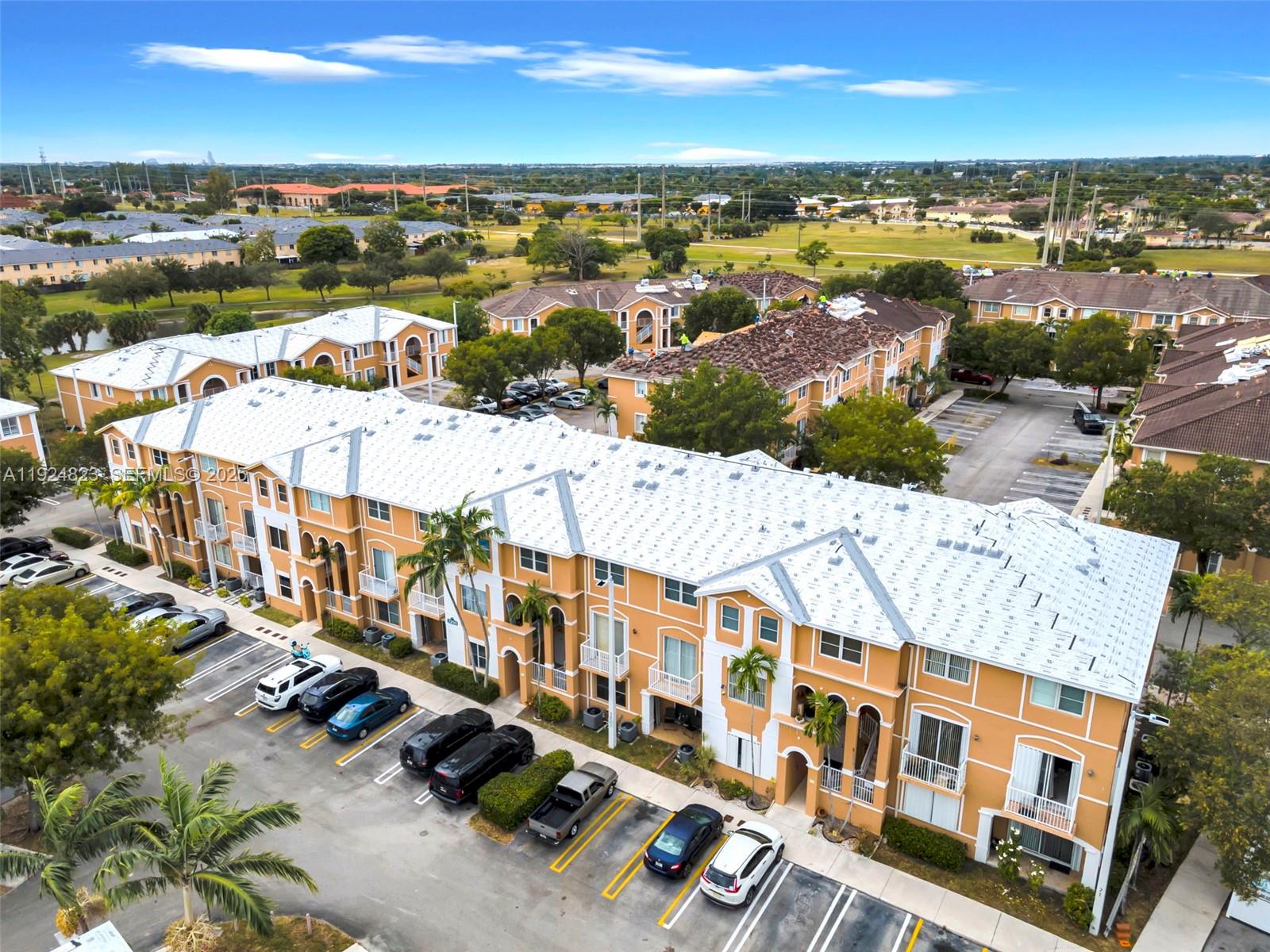 7250 Northwest 177th Street, Unit 10216 Hialeah, FL 33015 - Photo 2 of 23 a view of a city with an ocean view