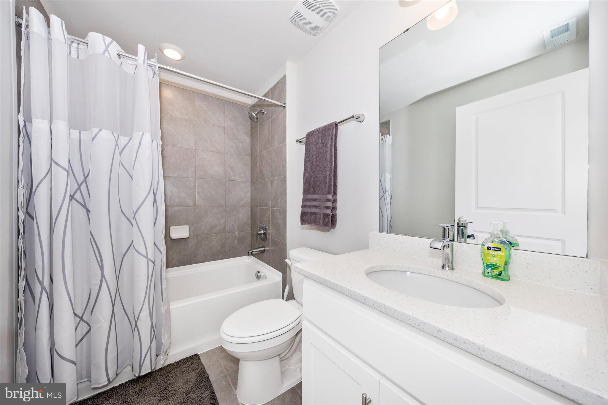 700 Bond Street Frederick, MD 21701 - Photo 36 of 49 a bathroom with a sink toilet and shower