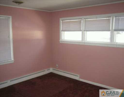 144 South Hill Road Colonia, NJ 07067 - Photo 8 of 8 an empty room with a window