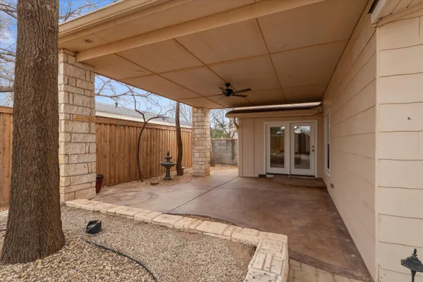 a view of a backyard of the house