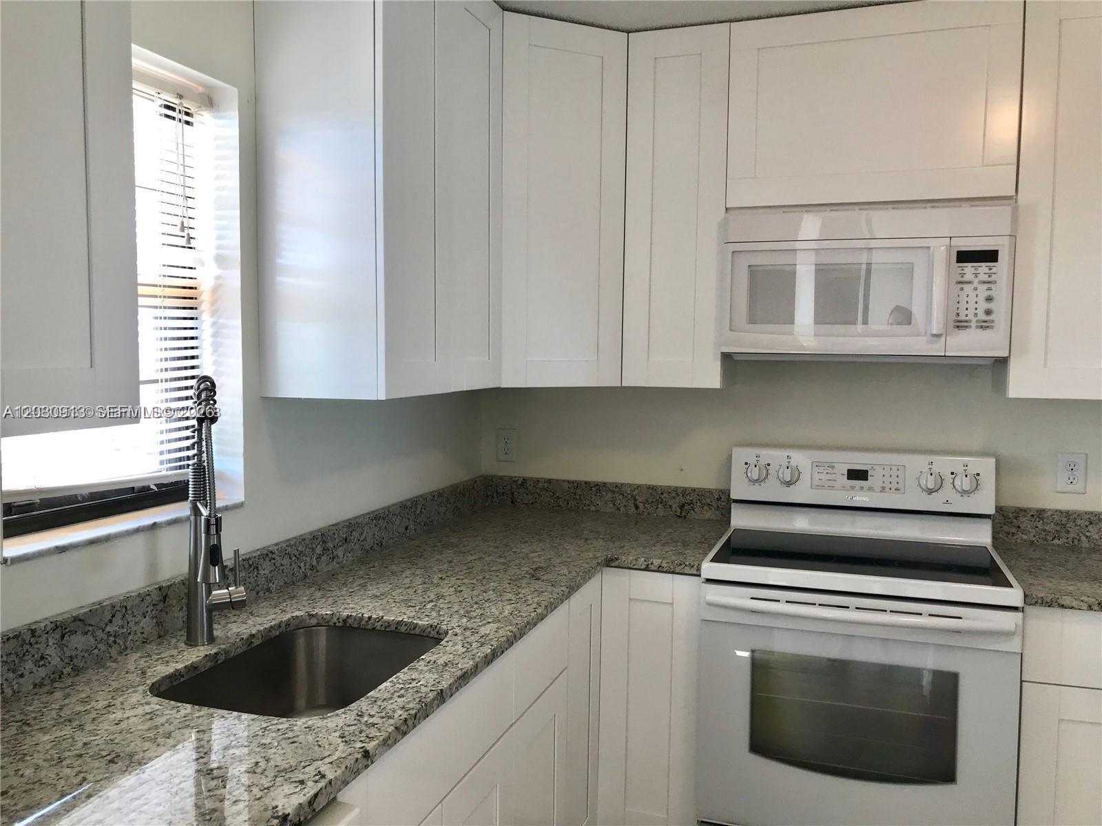 9273 Southwest 8th Street, Unit 402 Boca Raton, FL 33428 - Photo 4 of 14