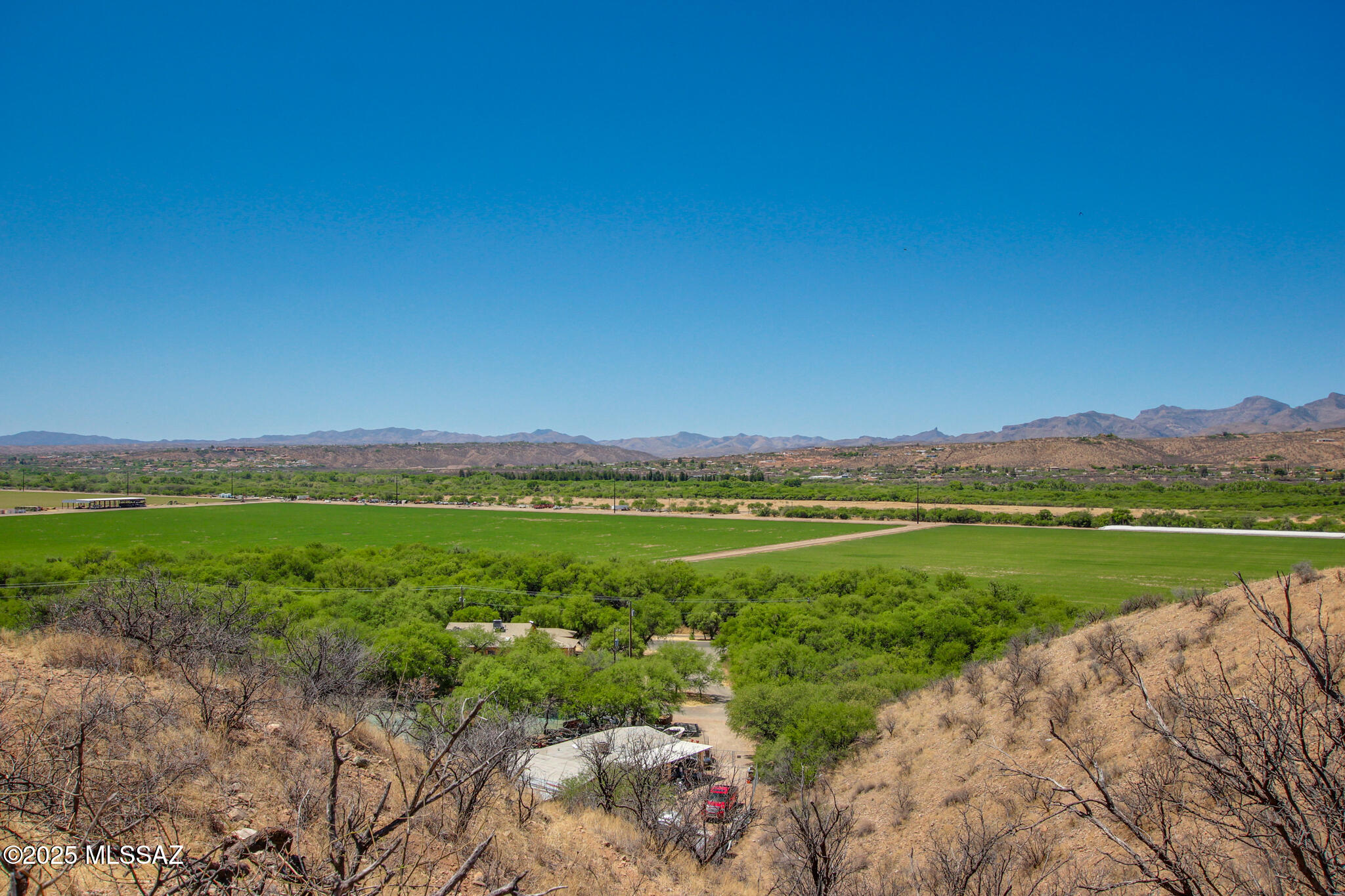 1398 Anclar Court, Unit 18 Rio Rico, AZ 85648 - Photo 3 of 30 a view of a city with an ocean