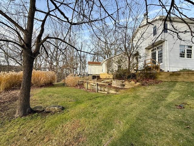 2549 West Hardies Road Gibsonia, PA 15044 - Photo 29 of 34 a backyard of a house with table and chairs