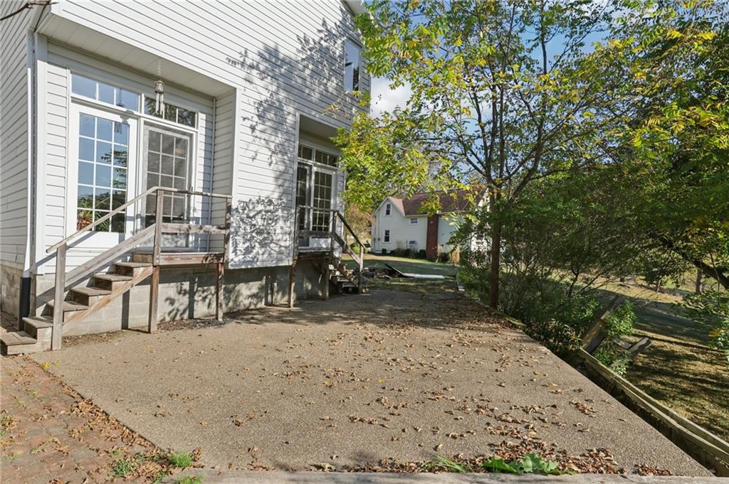 2549 West Hardies Road Gibsonia, PA 15044 - Photo 30 of 34 a view of a backyard with sitting area
