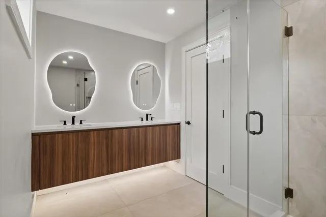 a bathroom with a shower and a toilet