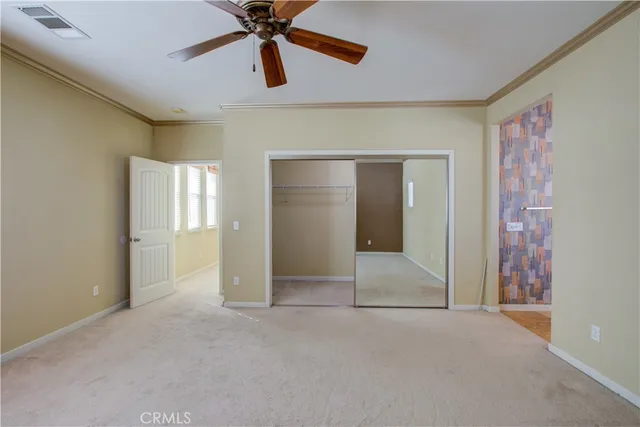 a view of an empty room and window