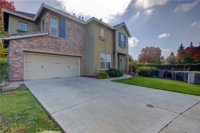 a house view with a garden space