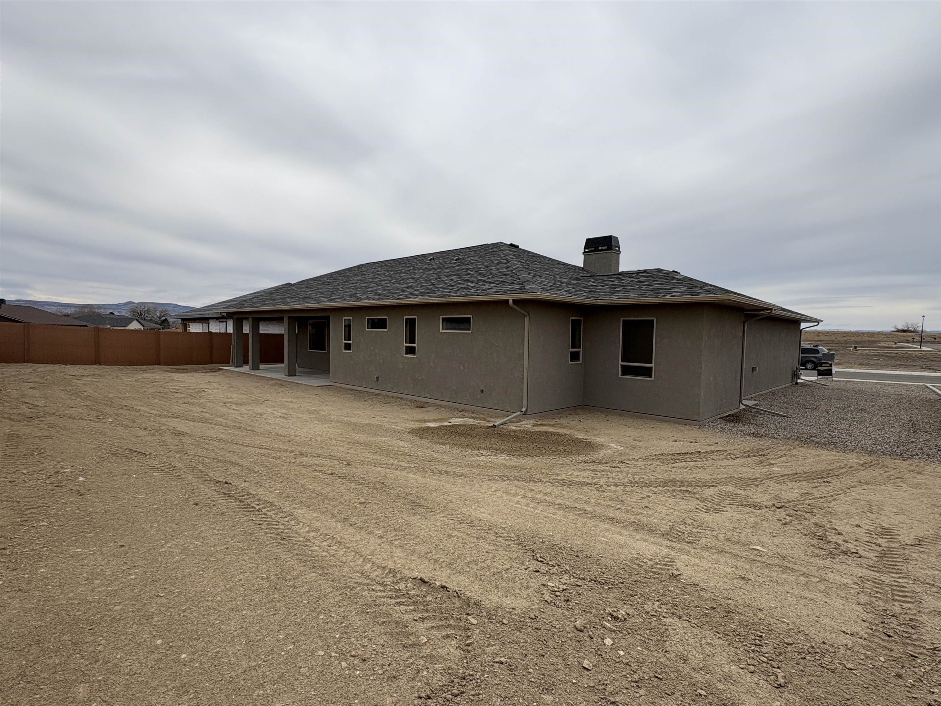 2629 Emerald Ridge Lane Grand Junction, CO 81506 - Photo 14 of 36 a front view of a house with a garden