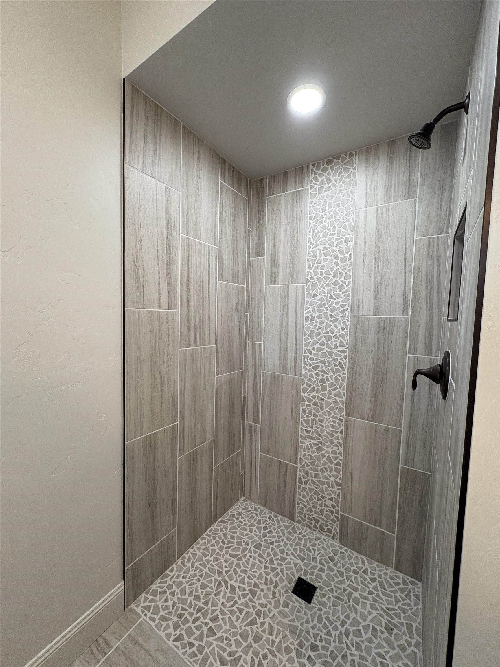 2629 Emerald Ridge Lane Grand Junction, CO 81506 - Photo 20 of 36 a bathroom with a shower and a sink