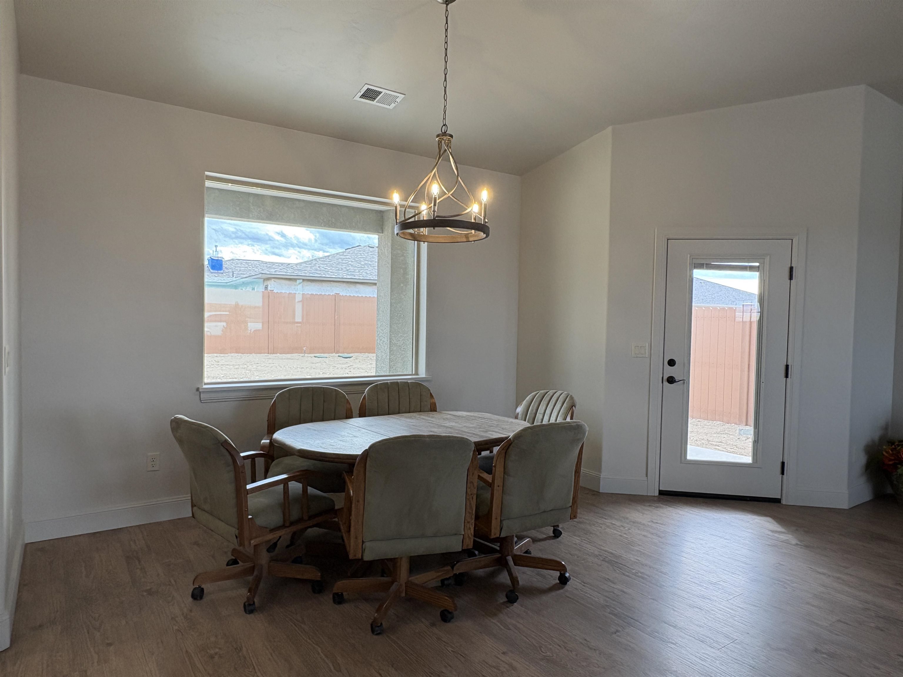 2629 Emerald Ridge Lane Grand Junction, CO 81506 - Photo 8 of 36 a dining room with furniture and window