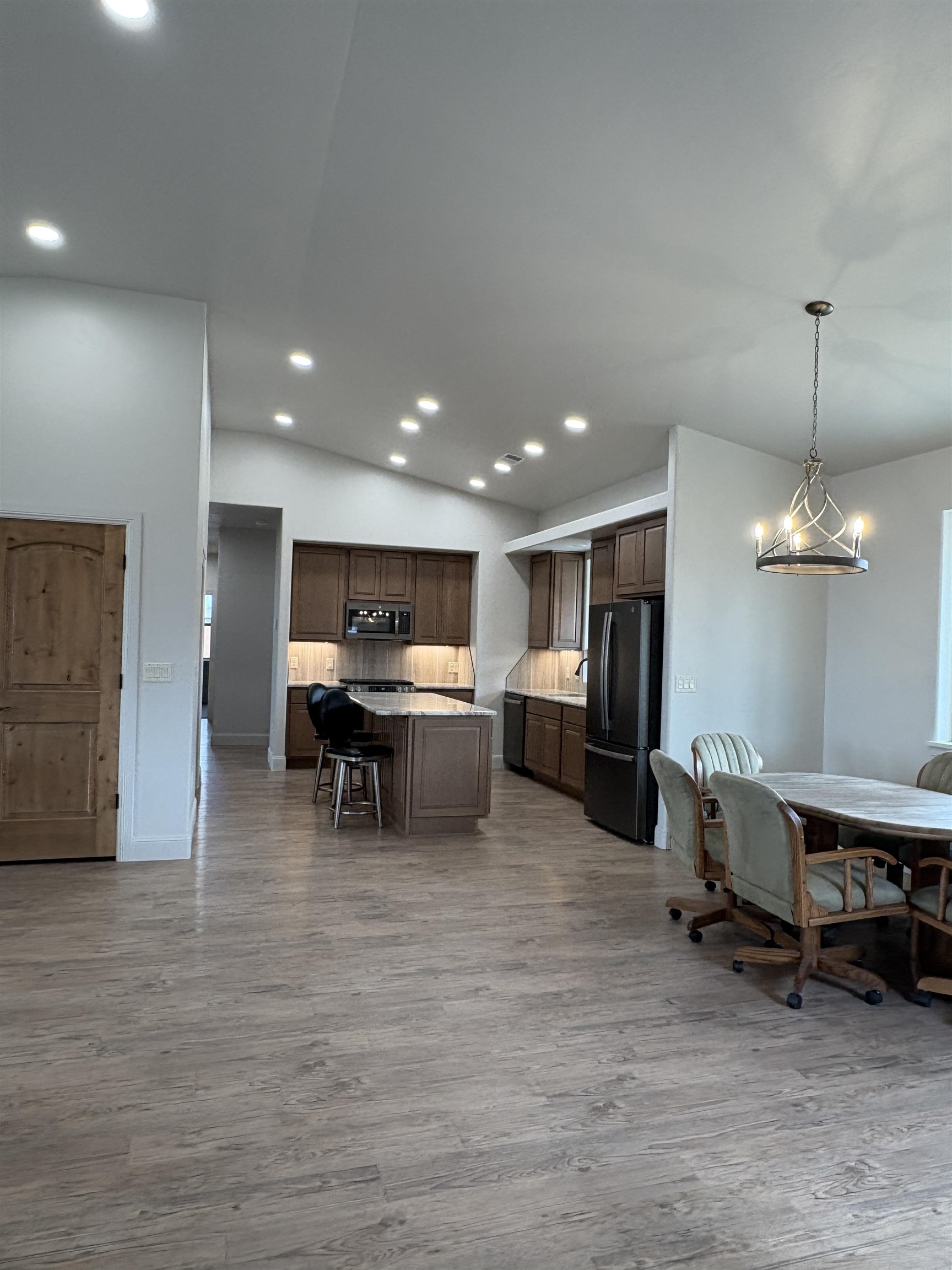2629 Emerald Ridge Lane Grand Junction, CO 81506 - Photo 10 of 36 a living room with furniture and kitchen view