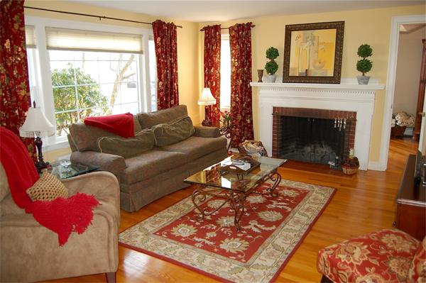 39 Shetland Road Marblehead, MA 01945 - Photo 4 of 12 a living room with furniture and a fireplace