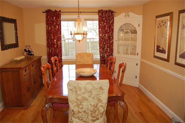 39 Shetland Road Marblehead, MA 01945 - Photo 5 of 12 a view of a dining room with furniture and chandelier