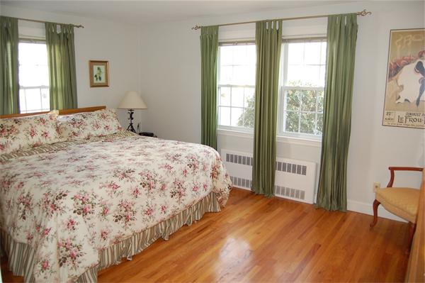 39 Shetland Road Marblehead, MA 01945 - Photo 6 of 12 a bedroom with a bed and a window