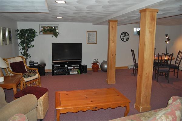 39 Shetland Road Marblehead, MA 01945 - Photo 10 of 12 a bedroom with furniture and a flat screen tv