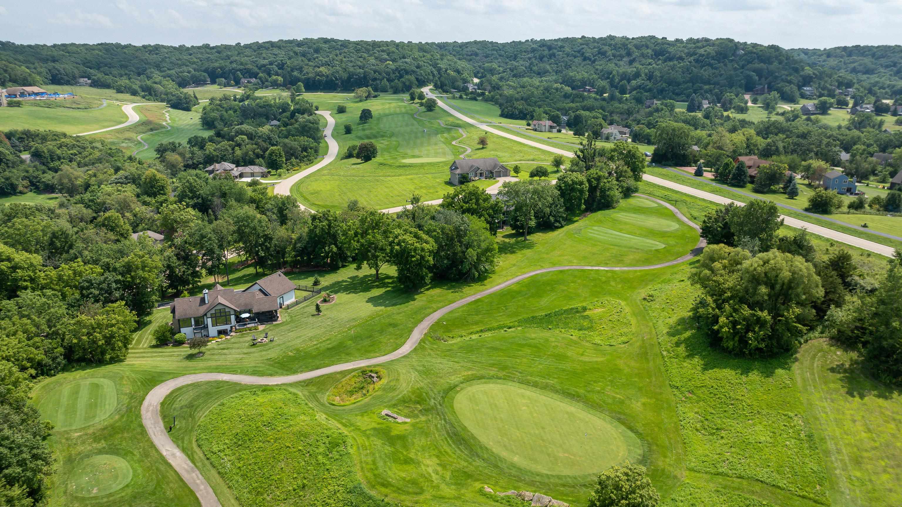 6 Hickory Trail Galena, IL 61036 - Photo 6 of 67 a view of a golf course with a swimming pool