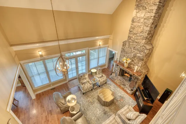 a bed room with furniture and a lamp