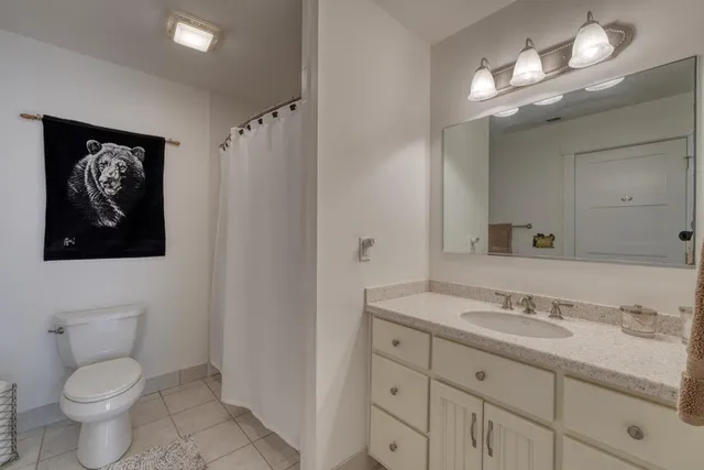 a view of a dinning table and chairs in the roof deck