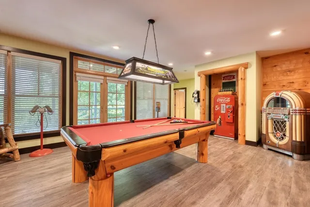 a view of a balcony with wooden floor