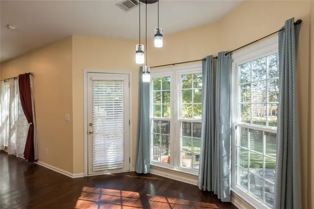 a view of a room with a large window