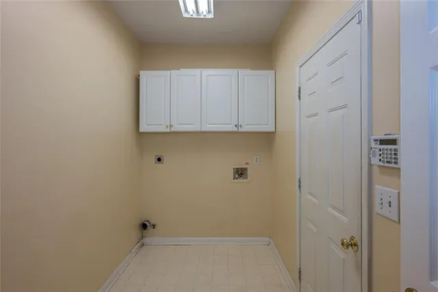 a view of cabinets and window