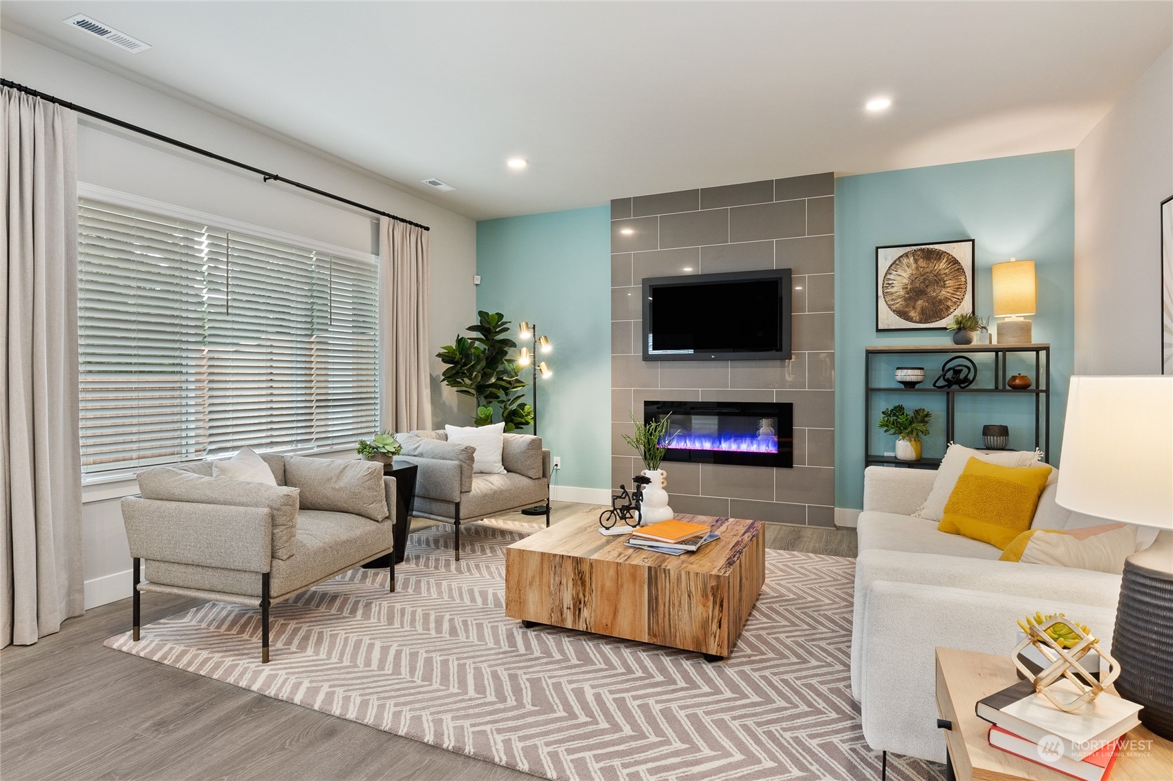 3810 198th Place Southeast Bothell, WA 98012 - Photo 14 of 32 a living room with furniture and a fireplace