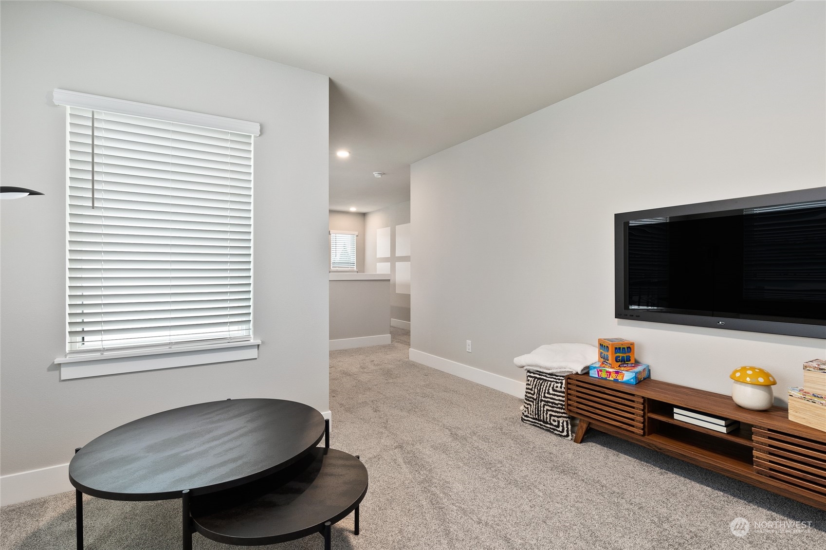 3810 198th Place Southeast Bothell, WA 98012 - Photo 26 of 32 a living room with furniture and a flat screen tv