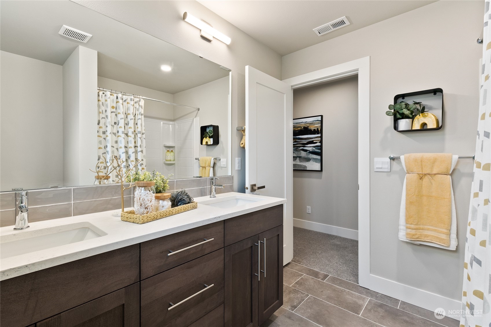 3810 198th Place Southeast Bothell, WA 98012 - Photo 28 of 32 a bathroom with a sink double vanity and a mirror