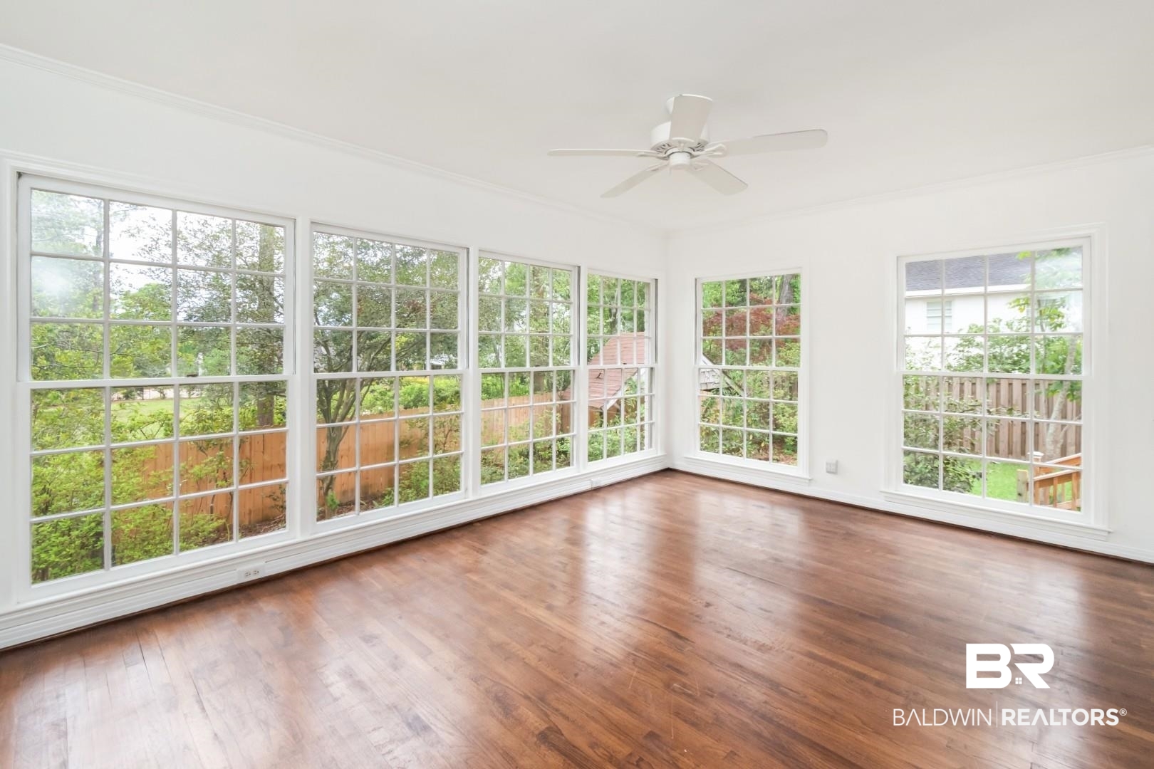 4 Turnout Lane Mobile, AL 36608 - Photo 19 of 53 Unfurnished sunroom with wood-type flooring and crown molding