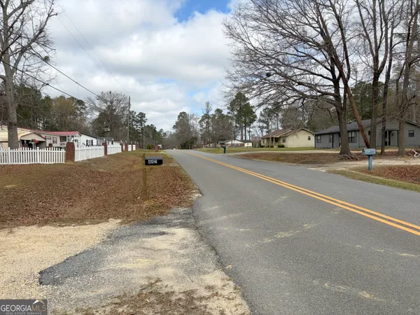a view of a street with houses