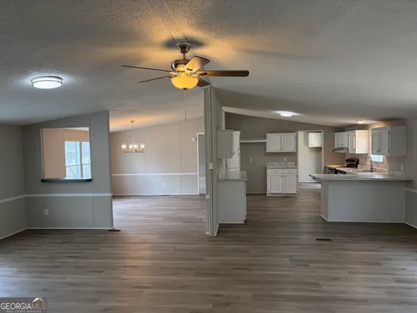 a view of kitchen and windows