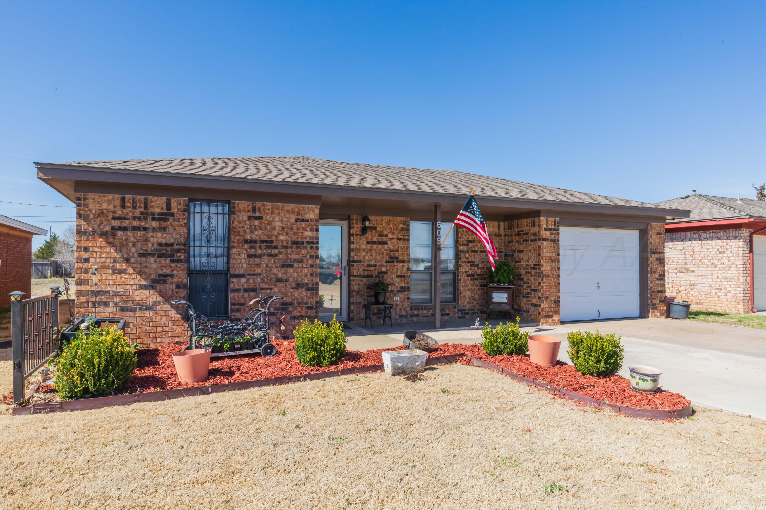 front view of a house with a patio