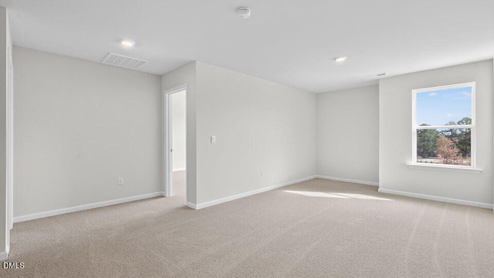 181 Fair Child Road Spring Lake, NC 28390 - Photo 18 of 43 a view of an empty room with a window