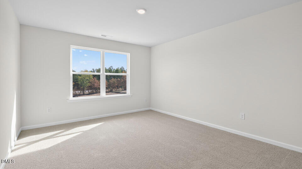 181 Fair Child Road Spring Lake, NC 28390 - Photo 24 of 43 an empty room with a window