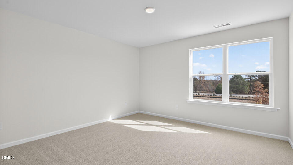 181 Fair Child Road Spring Lake, NC 28390 - Photo 26 of 43 an empty room with a window