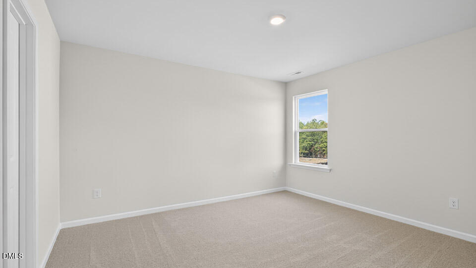 181 Fair Child Road Spring Lake, NC 28390 - Photo 28 of 43 an empty room with windows