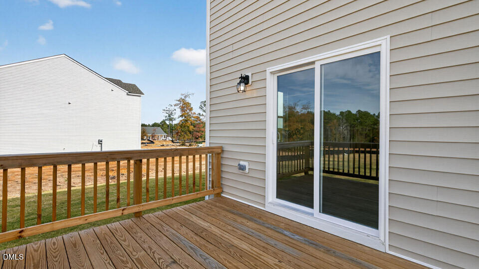 181 Fair Child Road Spring Lake, NC 28390 - Photo 34 of 43 a view of a balcony with wooden floor