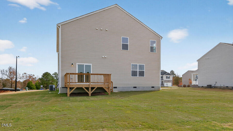 181 Fair Child Road Spring Lake, NC 28390 - Photo 37 of 43 a backyard of a house with table and chairs