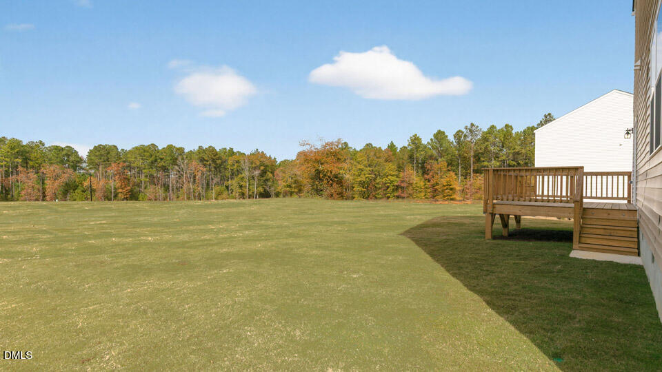181 Fair Child Road Spring Lake, NC 28390 - Photo 38 of 43 a view of yard with swimming pool and outdoor seating
