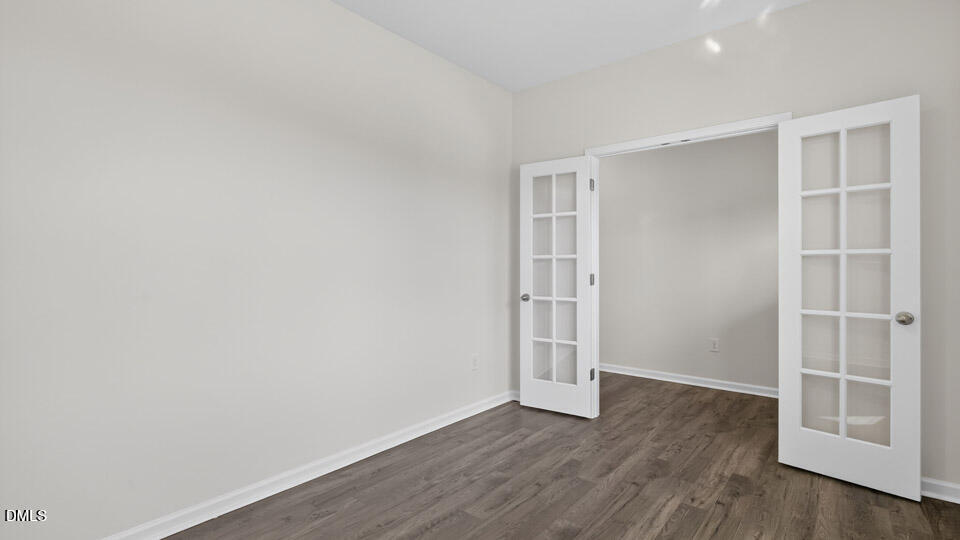 181 Fair Child Road Spring Lake, NC 28390 - Photo 5 of 43 a view of an empty room with wooden floor and closet